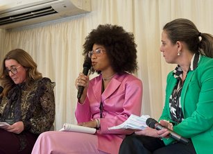 Mikaela Loach, Helen McEachern and Lucy Siegle speaking at an event