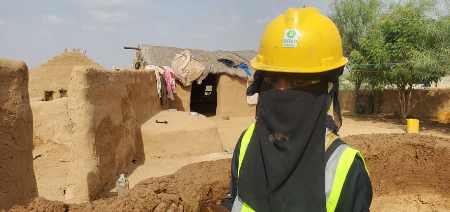 Maryam during work on her kitchen, Yemen