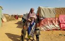Khadra and her children at a displacement camp