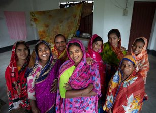A group of women from Bangladesh looking confidently to camera