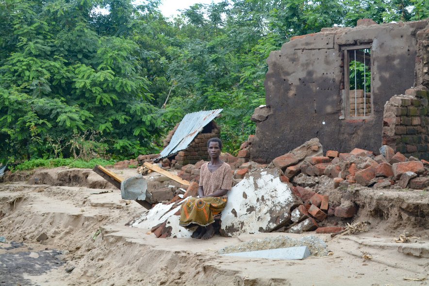Rozina in front of her home, Malawi - Cyclone Freddy